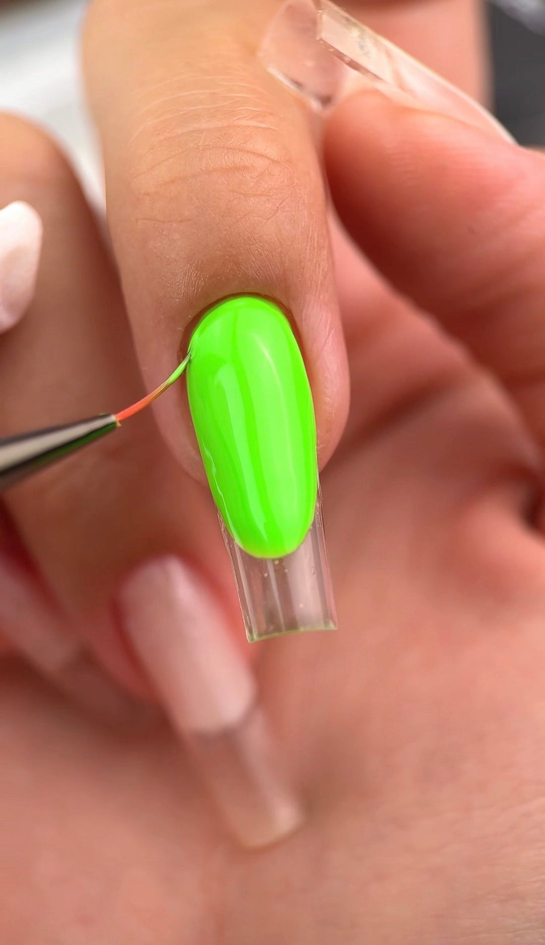     Side-by-side comparison of coffin nails and almond nails with glossy gel polish.